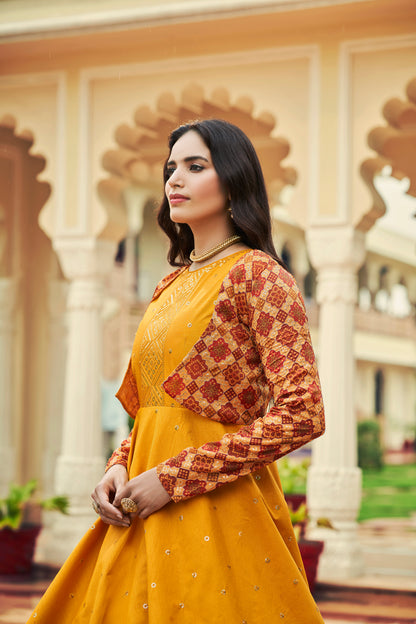 Mustard Yellow Anarkali Gown with Jacket features sequin and resham embroidery