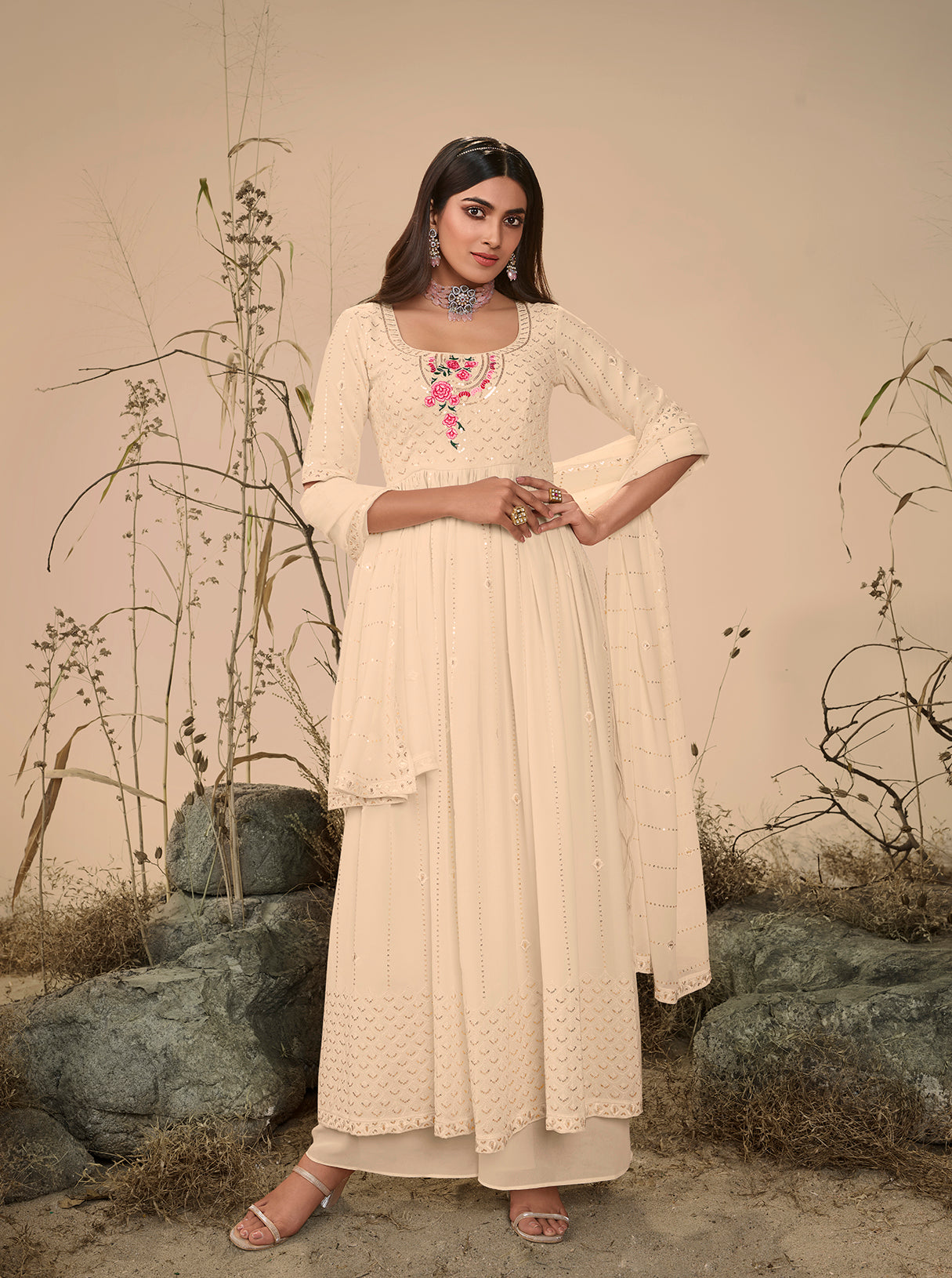 Off White Georgette Embroidered Kurta Palazzo Set features detailed embroidery