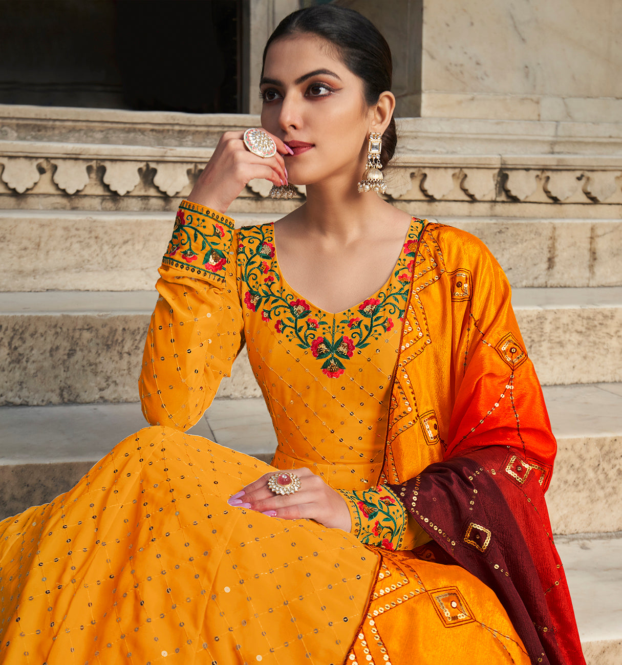 Elegant Orange and Red Georgette gown with delicate thread and sequin embellishments