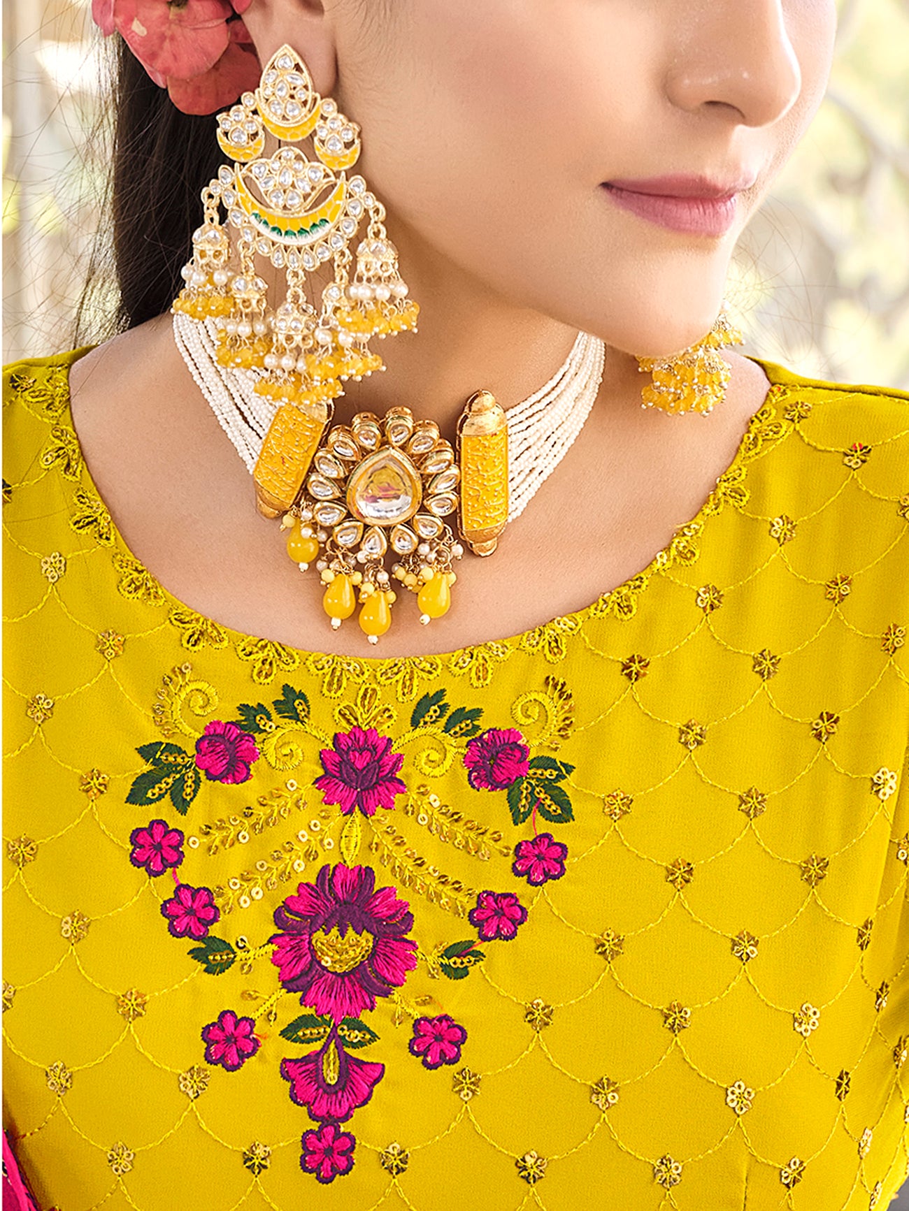 Yellow and Purple Georgette Kurta Palazzo Set features thread and embroidery