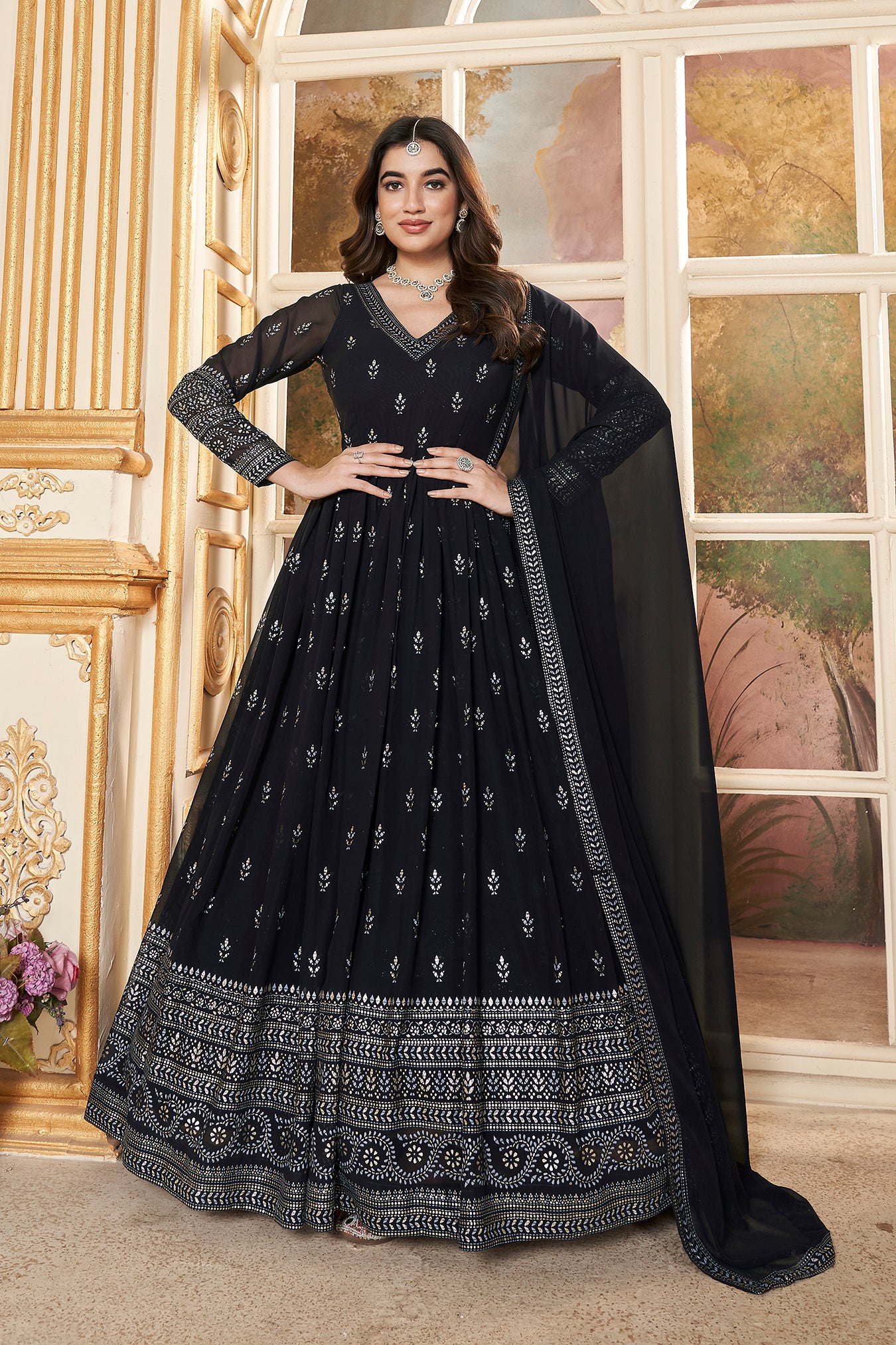 Black Anarkali gown with metallic foil accents and matching dupatta