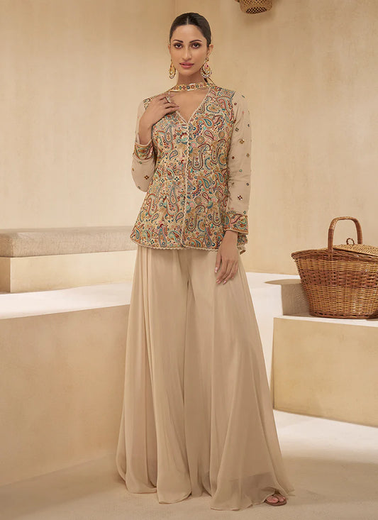 Light Brown Multicoloured Sharara Suit features vibrant embroidery and a flared bottom