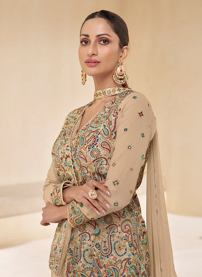 Light Brown Multicoloured Sharara Suit features vibrant embroidery and a flared bottom