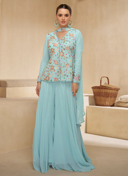 Sky Blue Multicolored Sharara Suit features vibrant embroidery and a flared bottom