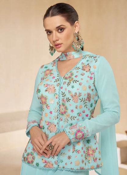 Sky Blue Multicolored Sharara Suit features vibrant embroidery and a flared bottom