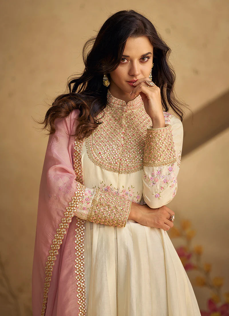 Off White Multi-Embroidery Anarkali Pant Suit features a stylish slit