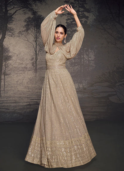 Elegant Beige Anarkali Gown with Golden Embroidery