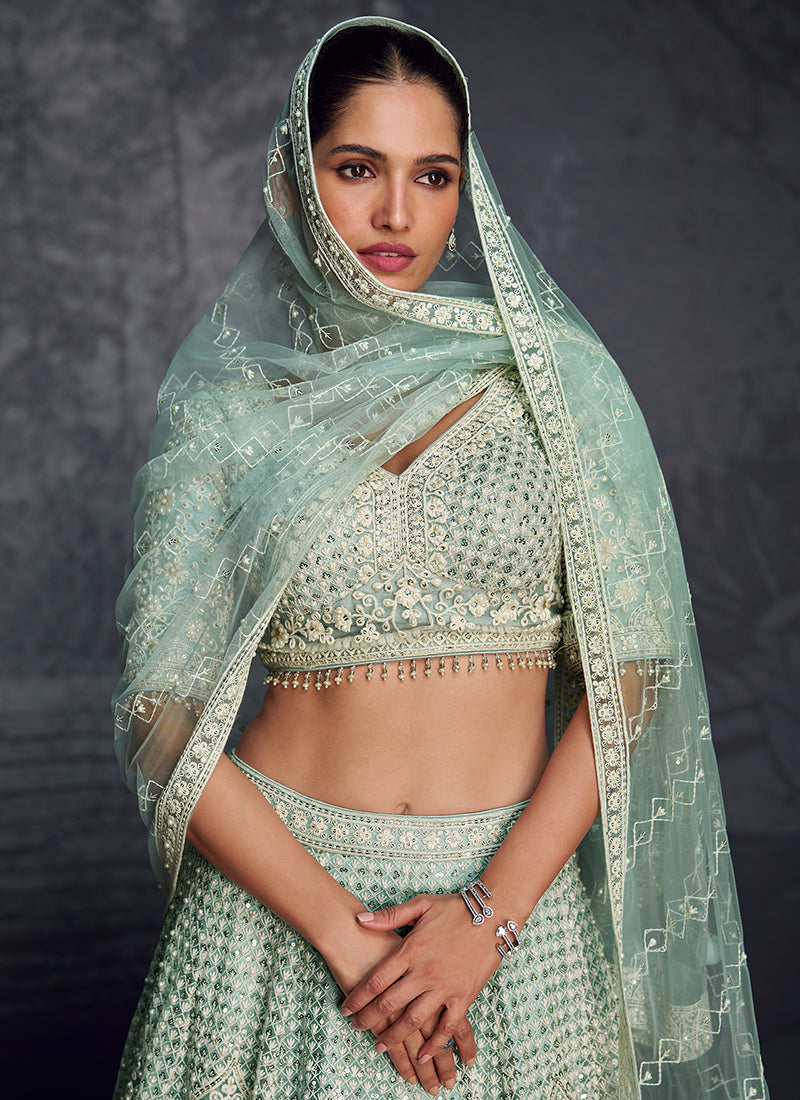 Mint Green Net Embroidered Lehenga Choli - Exquisite Choice for Weddings and Festive Celebrations - Elegant Detailing with Intricate Embroidery