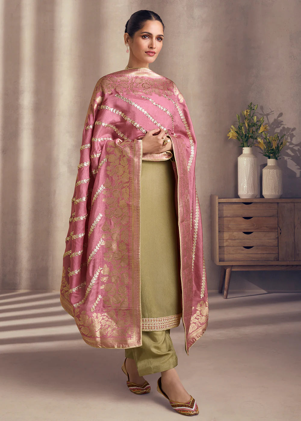 Shop the latest Indian suits for women from party wear to casual salwar suits